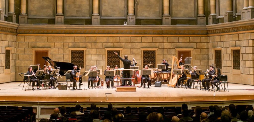 Violinist Holly Workman performing Lachenmann Concertini with conductor Brad Lubman in Kodak Hall, Rochester