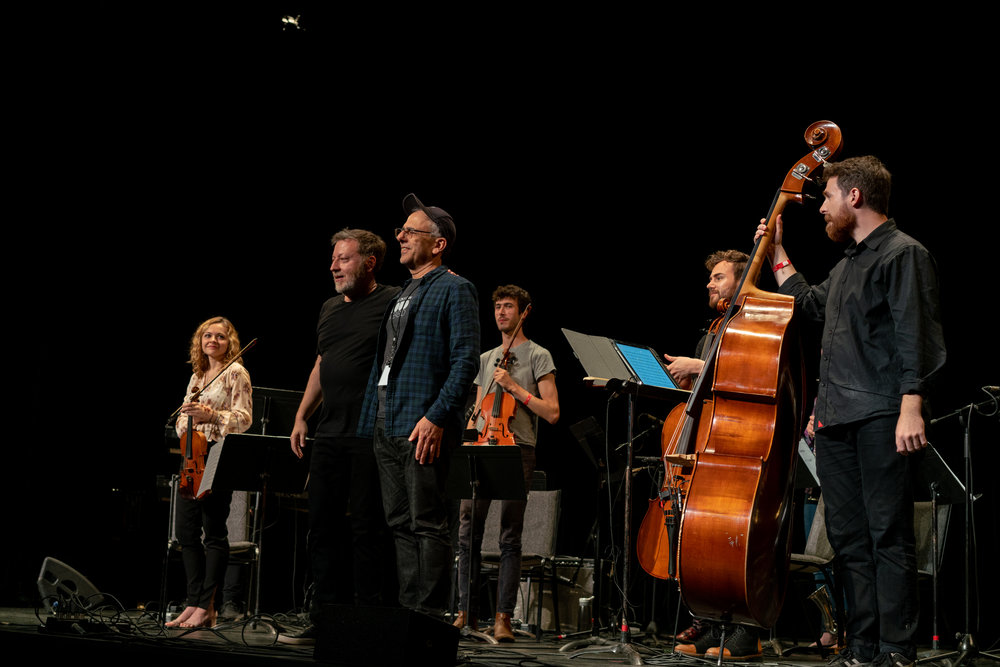 Violinist Holly Workman with conductor Brad Lubman and composer Michael Gordon